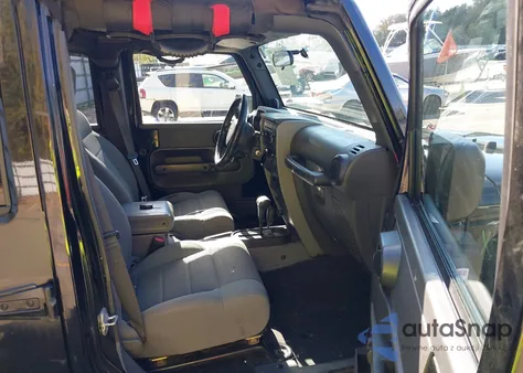 2007 Jeep Wrangler Unlimited Sahara z USA, uszkodzony, nr VIN 1J4GA59187L207002